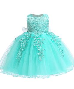 VESTIDO CON BORDADOS Y TUL